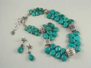 Blue Chinese turquoise teardrops with handmade Balinese sterling